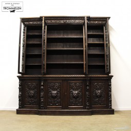 Green Man carved bookcase