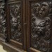 Green Man carved bookcase