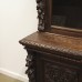 Green Man carved bookcase
